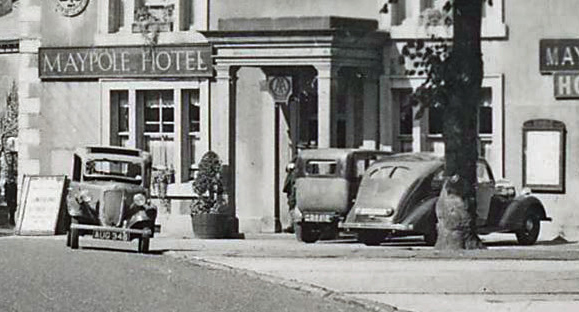 Maypole Inn ( detail).jpg - Close up view of the cars in the previous image.   ( Can anyone identify the make/model of the cars and hence possible date of the photograph? )